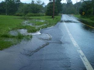 Road flooded with rain runoff