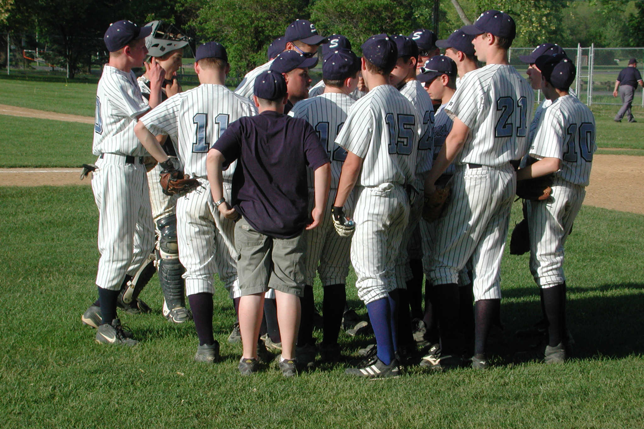 Baseball Huddle at Cantine Field - Nancy Campbell